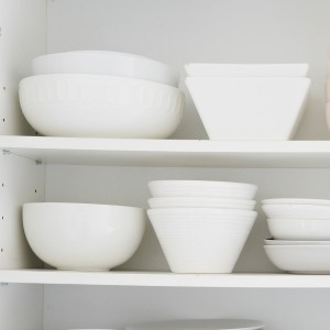 Shelf supports for a cabinet